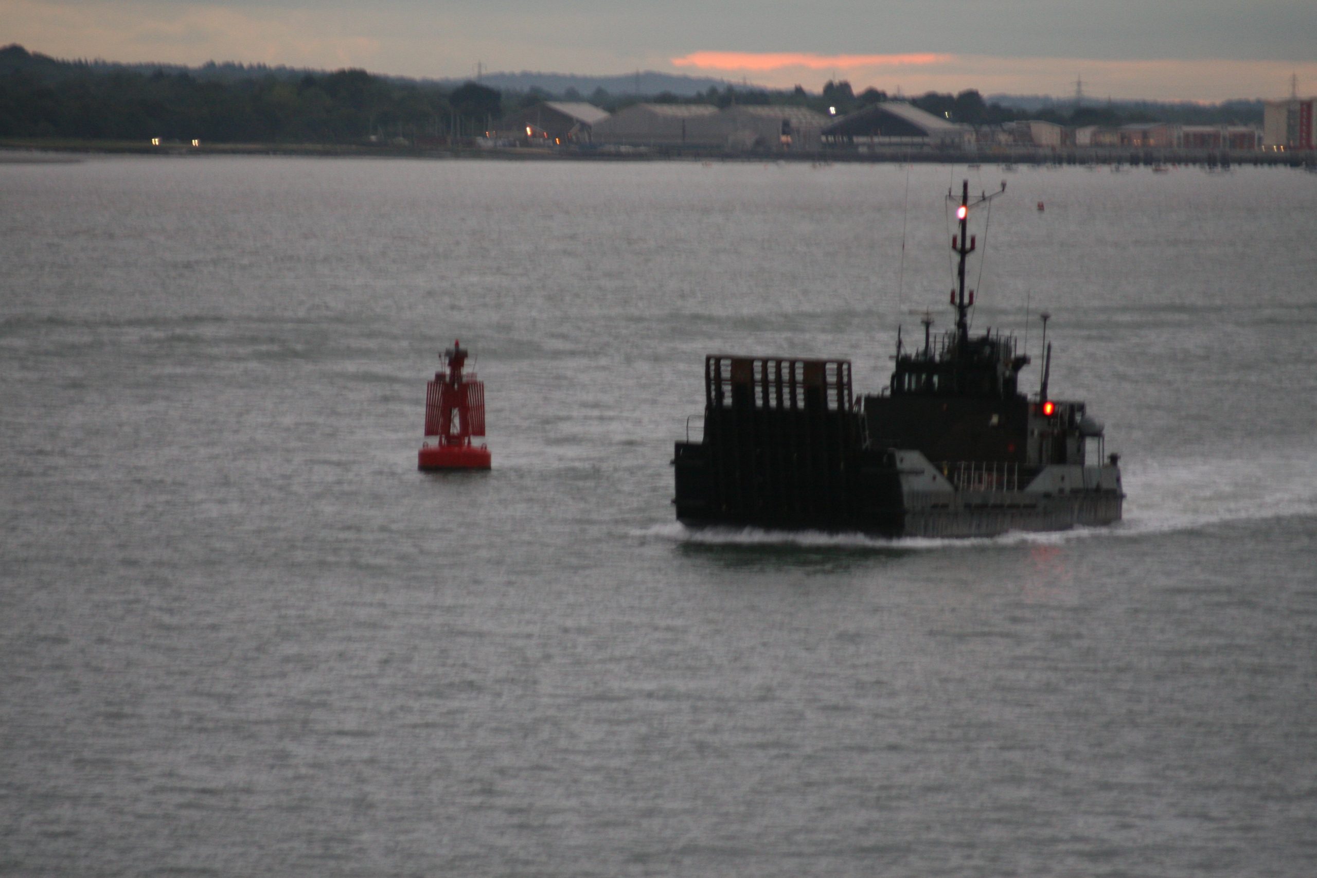 Power Driven and Buoy at Dusk